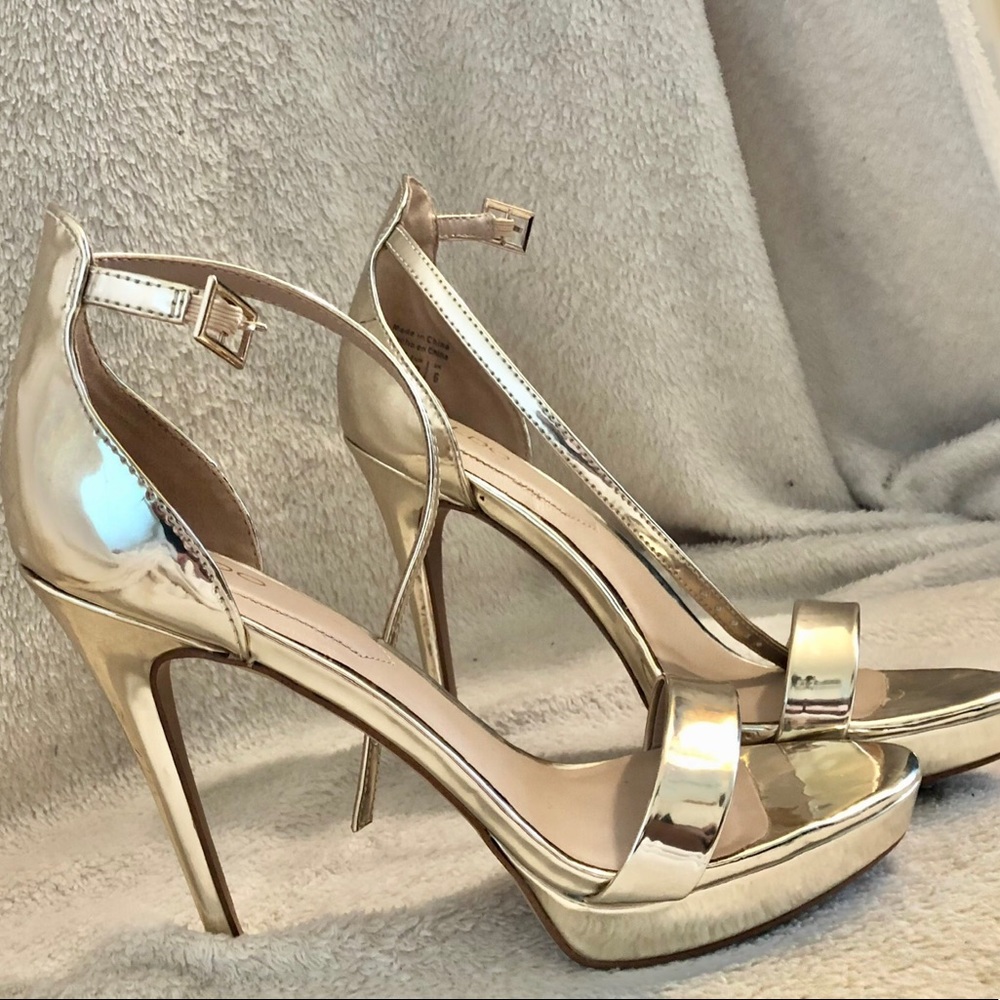 Golden Aldo heels